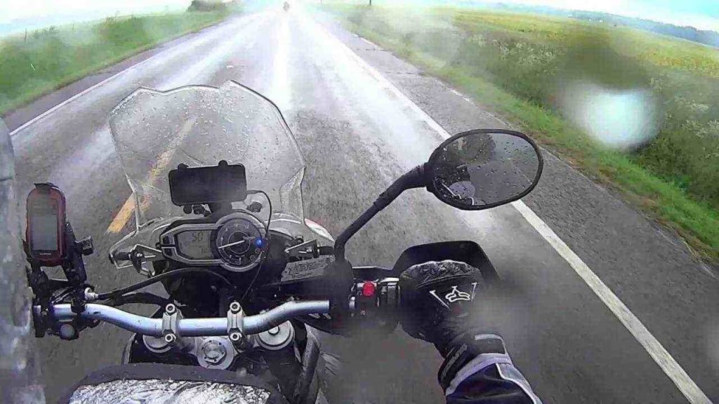 riding a bicycle in the rain